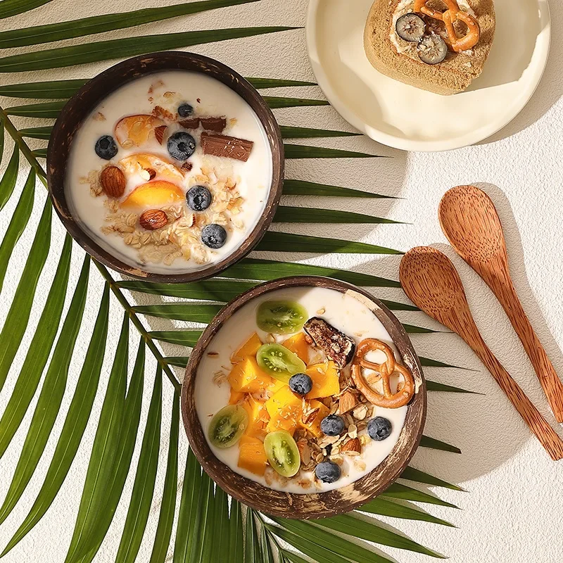 Two coconut yogurt bowls in afternoon sunlight